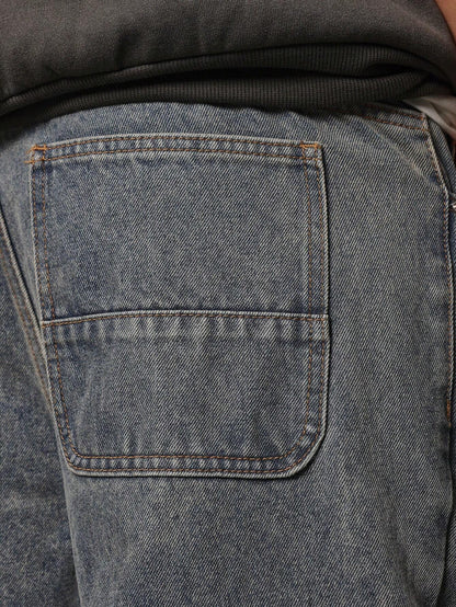 Calça Denim Solto com Aplicação Stars