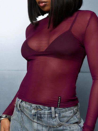 Camiseta Ajustada de Mangas Longas e Gola Redonda em Tela